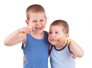 boys brushing his teeth
